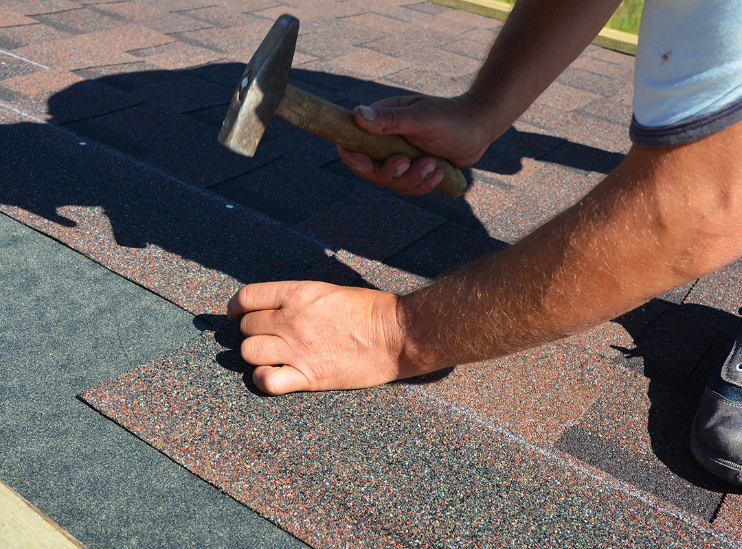 Installing roof shingles